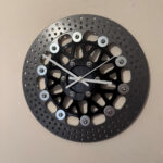 Clock made and upcycled from a motorcycle brake disc - white hands